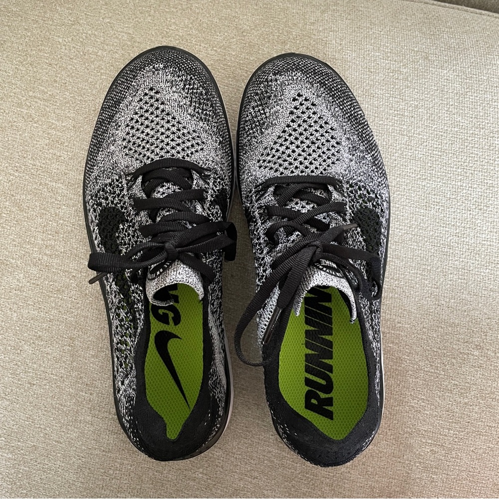 Nike Women's Black and White Flyknit Running Shoes with Green Insoles